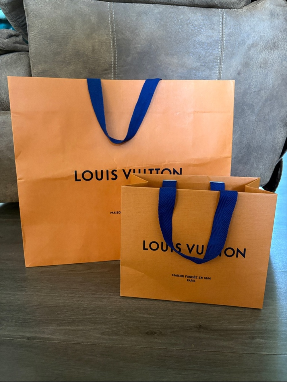 Authentic Louis Vuitton Orange Shopping Bags with Blue Handles